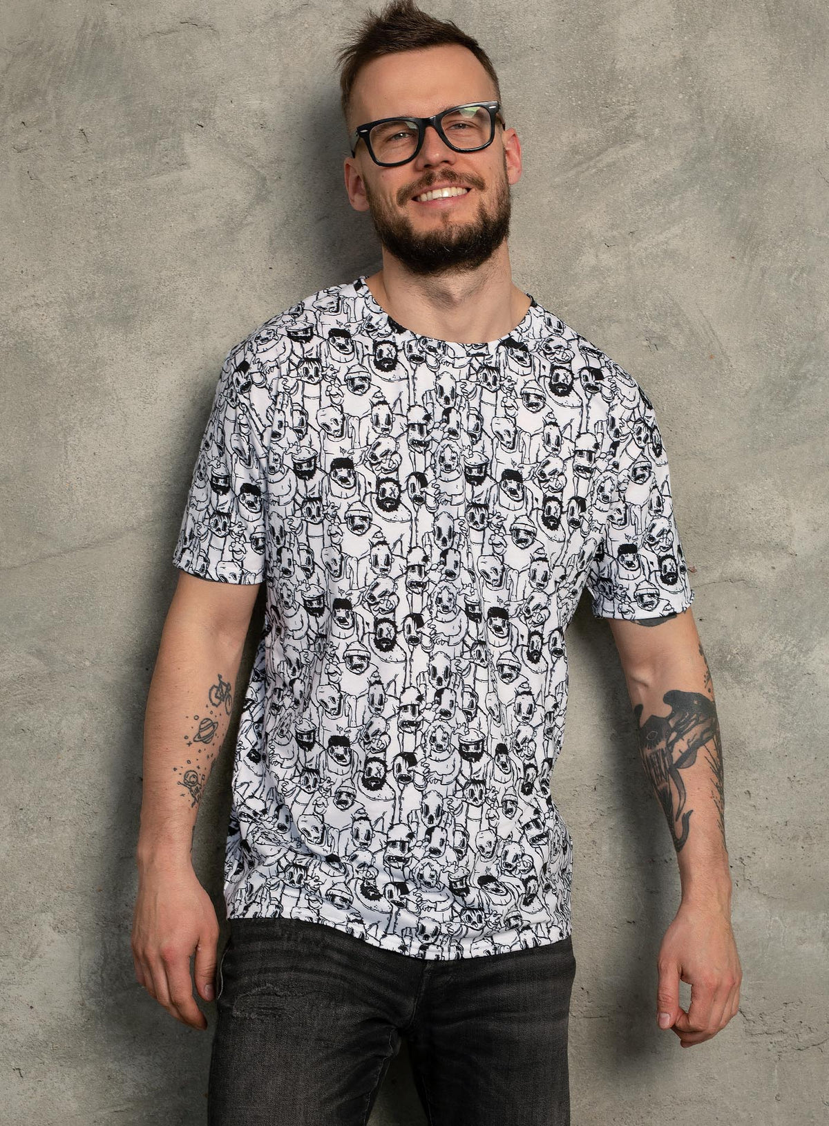 Man modeling an All over dye sublimation t-shirt featuring retro illustrated zombies by Sasha Sidorovich.