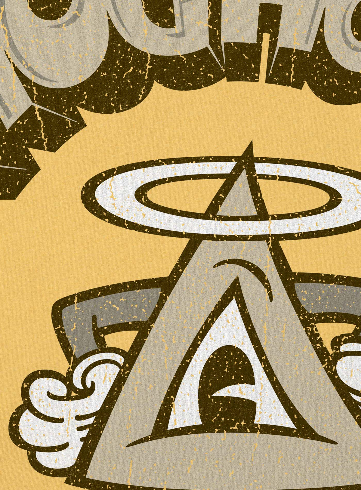 Detail of yellow unisex t-shirt featuring a front print of a cartoon character based on the mythical Eye of Providence. By Mexican illustrator G.M. Meave