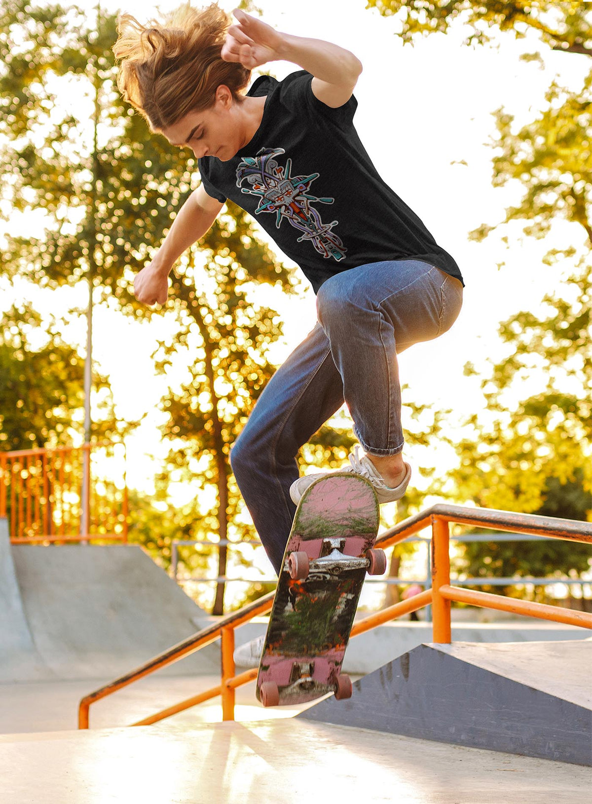 Man modeling a Heather black unisex t-shirt featuring a front print of Tzontecotl, the Nahua word for skull, associated with a mask that submerged the wearer into the underworld. illustrated by G.M. Meave.
