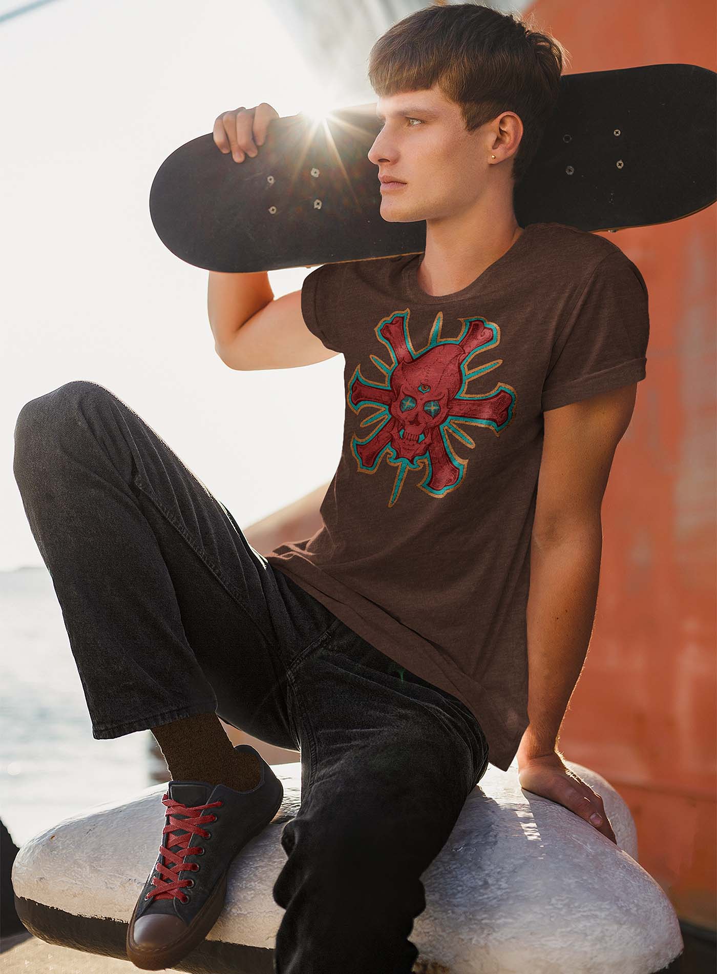 Female modeling a Heather brown unisex t-shirt featuring a front print of a three-bone alien Jolly Roger pirate illustration by G.M. Meave.