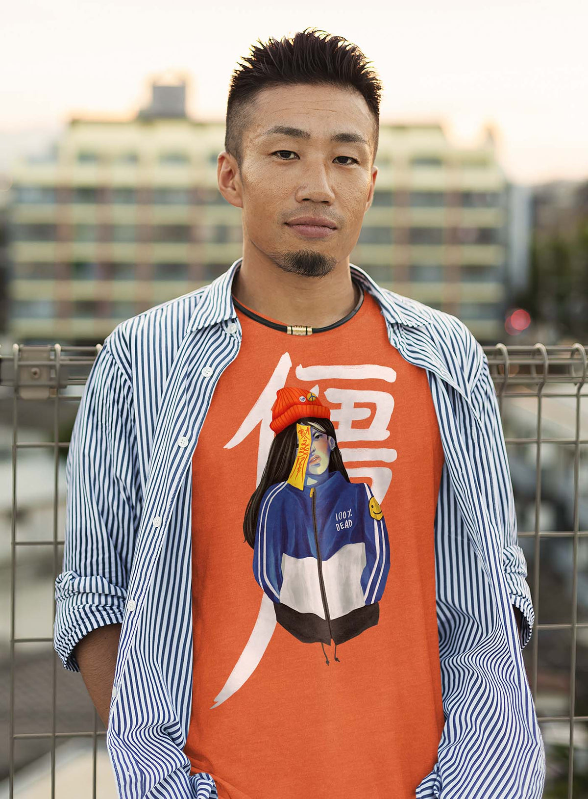 Man modeling a Heather orange unisex t-shirt featuring a front print of a jiangshi Chinese zombie in urban outfit illustrated by Aiken Lao.
