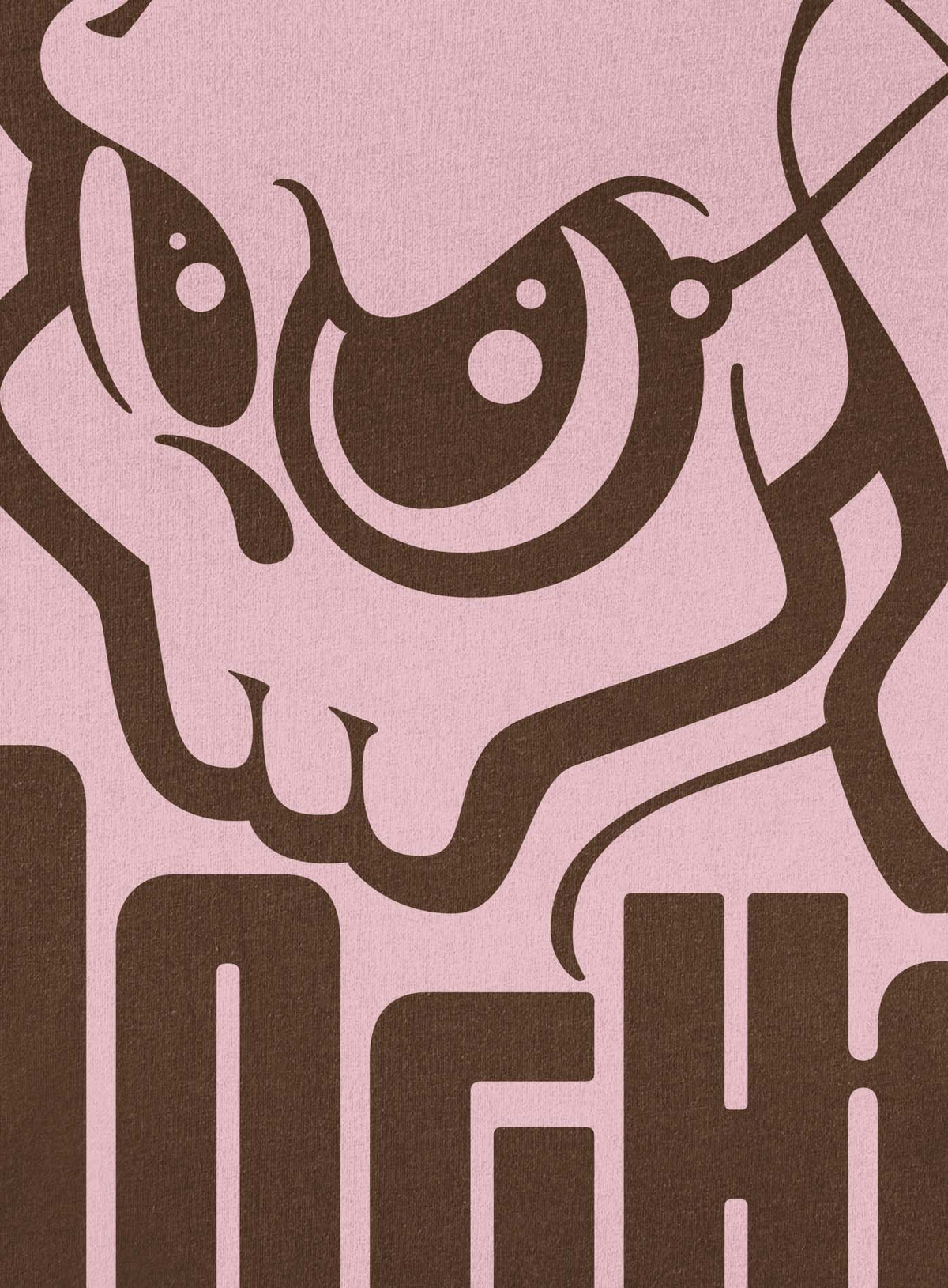 Detail of Pink unisex t-shirt featuring a yellow Mr. Shade Moghoul logo by G.M. Meave.